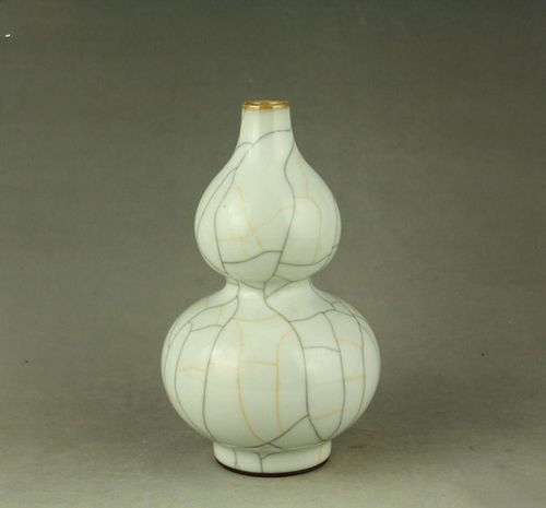 哥窯葫蘆瓶 從收藏鑒定到拍賣(mài)修復(fù)的藝術(shù)之旅